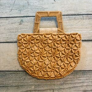 A new day Target tan beaded wicker hand purse.